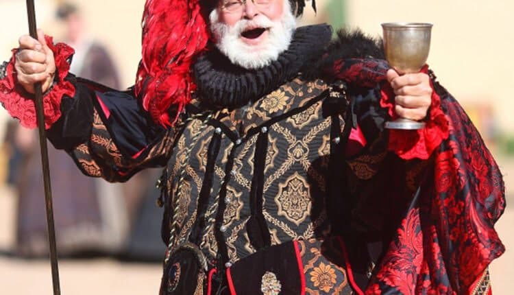 Reveler enjoying a drink at a Renaissance faire